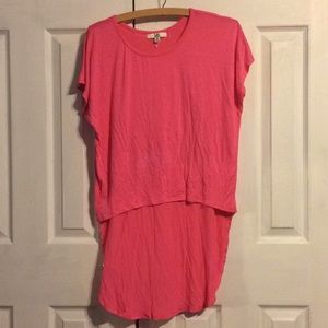 Pink shirt that is long in the back